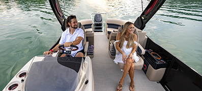A couple enjoying their Harris pontoon