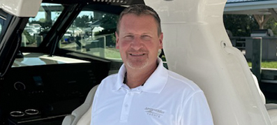 Michael Herron posing aboard a MarineMax vessel