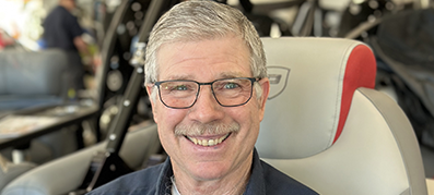 a marinemax service tech smiles for a picture