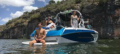 Valuk family on their Nautique boat