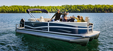 Premier Pontoon on the water with a group of people