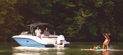 Family on a Sea Ray in a lake