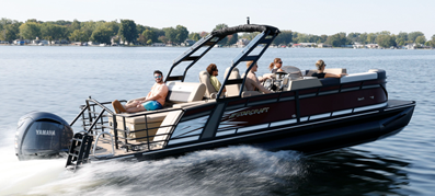 A starcraft SX series pontoon on the water