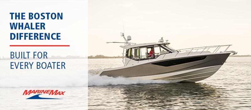 tan and white Boston Whaler model in the water with marinemax logo on thumbnail