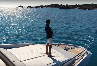 Man standing on bow of Azimut yacht