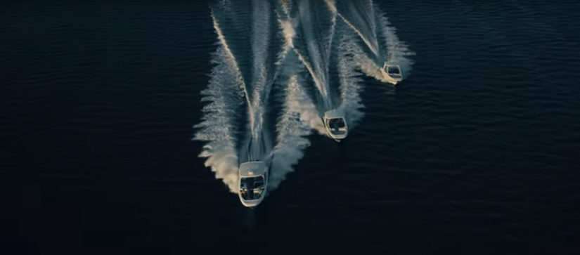 Boston Whaler Vantage Family of Boats Cruising Across Water