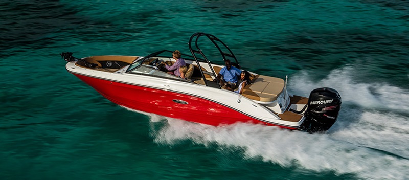 Friends on a Sea Ray SPX 230 OB cruising through water
