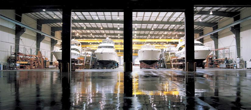 Sea Ray boat factory with four Sea Rays on the back