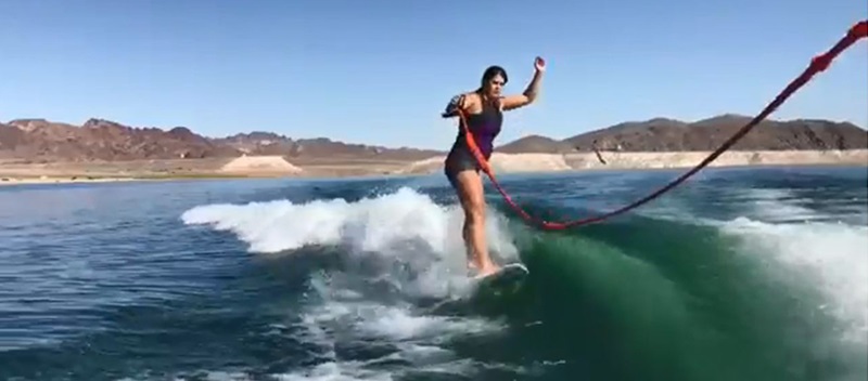 A woman wakesurfing