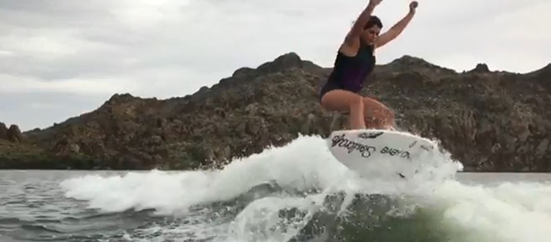 A woman wakesurfing