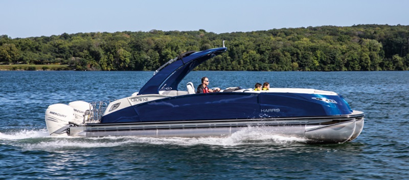 Harris Crowne Pontoon boat out on the water