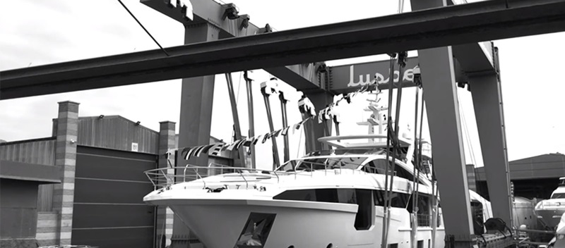 black and white of large yacht in a lift