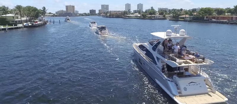 A row of Azimut Yachts in the water