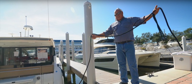 Captain Keith on the docks showing how to keep your dock lines tidy