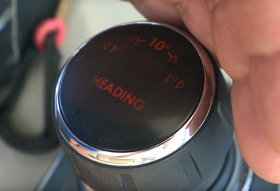 Hand holding the joystick - Joystick Auto Heading Mode Video