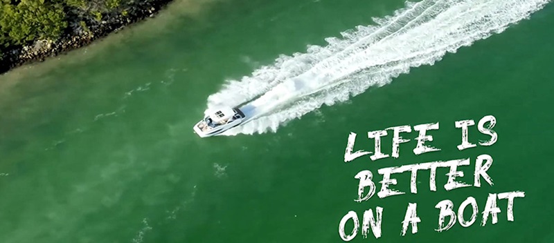 Aerial shot of an Aquila boat in the water