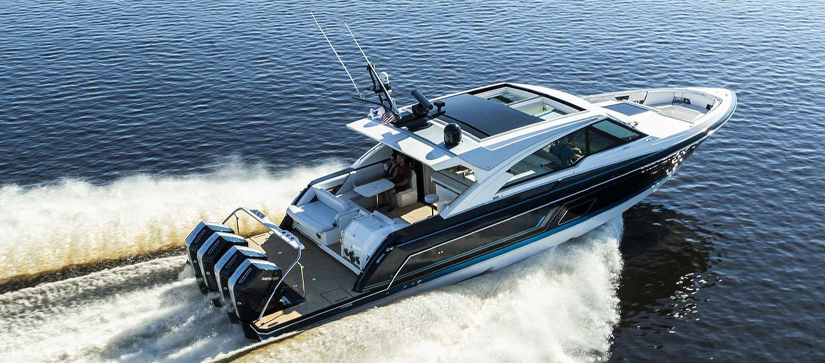 Boat on the water with 4 Mercury Engines