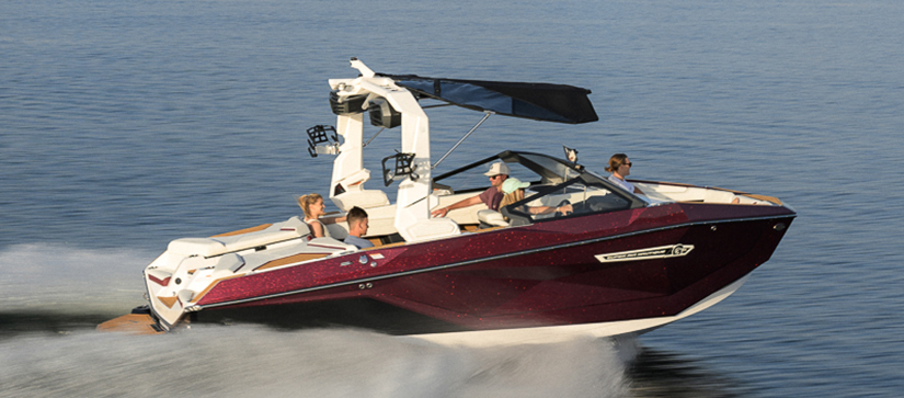 A maroon Nautique on the water