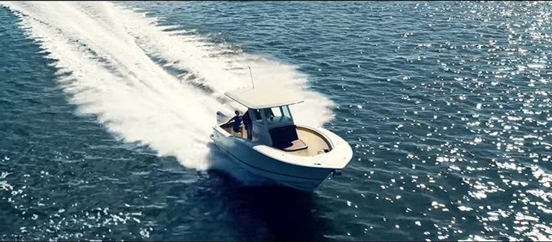 A Scout Boat cruising on the water