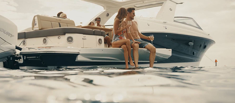 People sitting on a Sea Ray boat