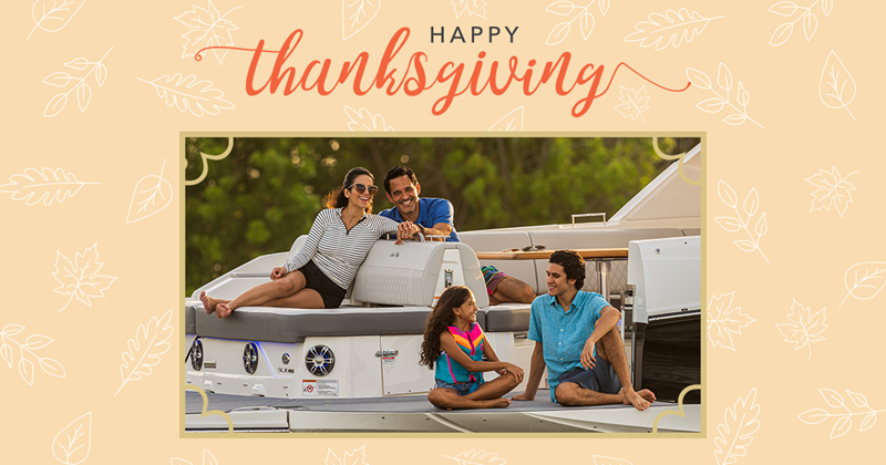 Happy Thanksgiving text with light orange background with white leaves and family sitting on boat smiling