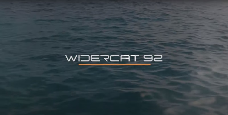Wider Cat 92 text with ocean background
