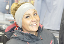girl with a headband-ear warmer and a ski parka