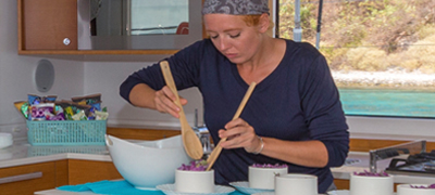 Chef preparing dessert at sea