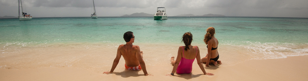 Family relaxing on beach