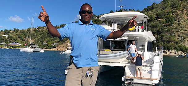 person talking in front of MarineMax charter