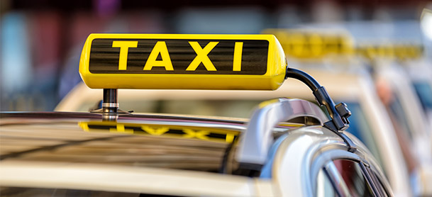 Close up of a taxi sign