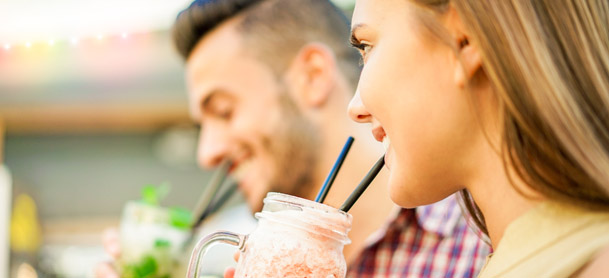 Couple enjoying a cold drink together