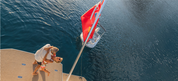 BVI flag on a boat with couple dancing