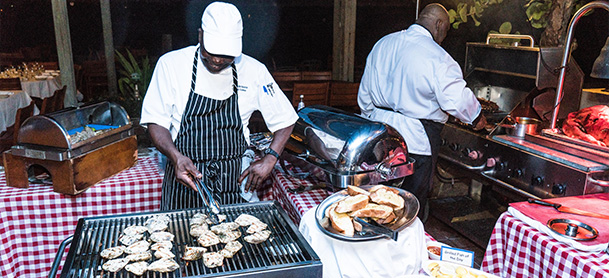 Chefs cooking at event in the BVI