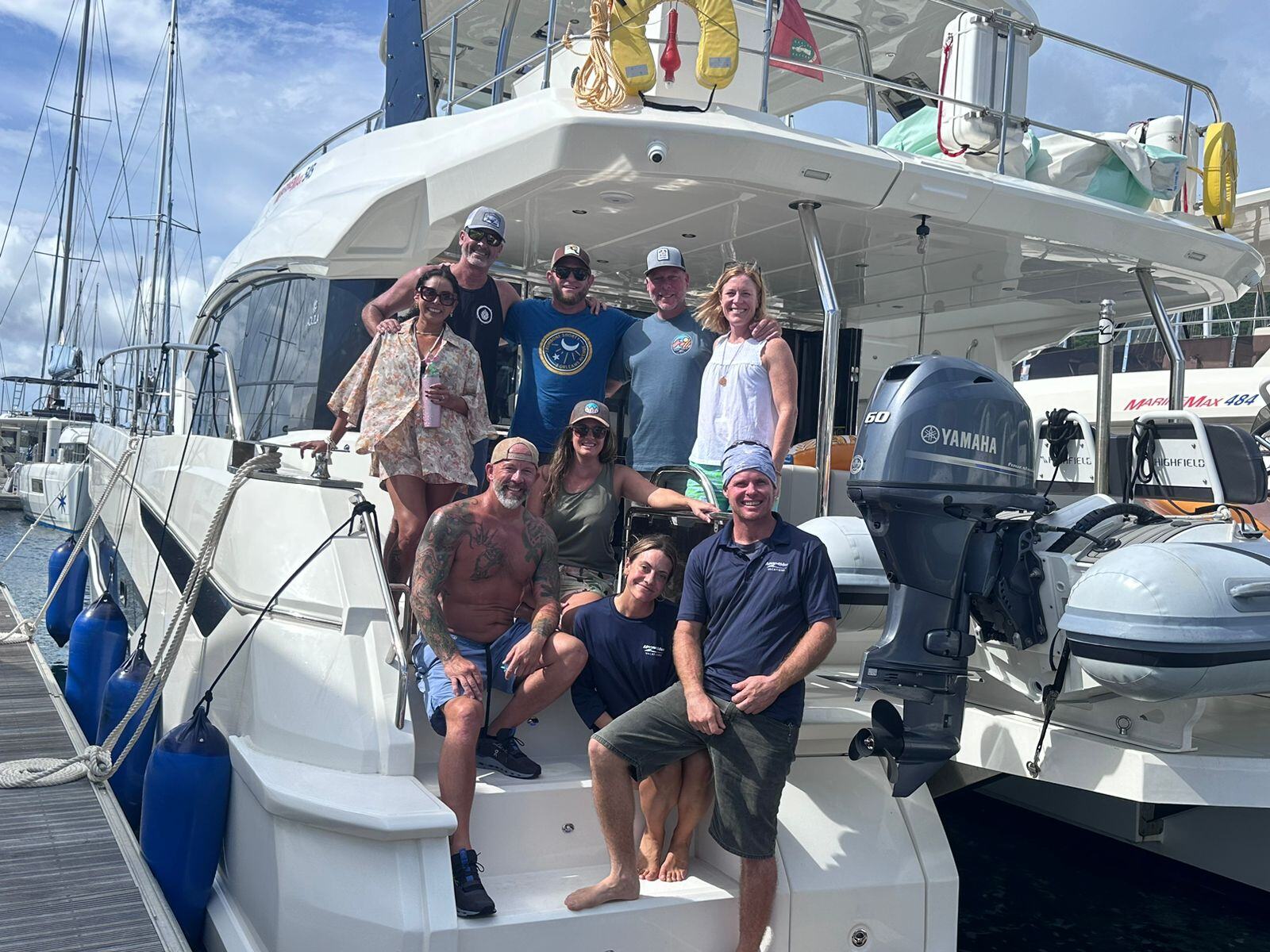 Happy customers posing for a picture after their Painted Pelican voyage