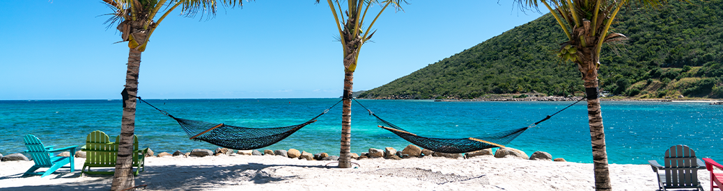 Two Hammocks by the water 