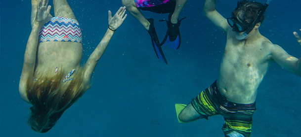 Children underwater snorkeling in the BVI