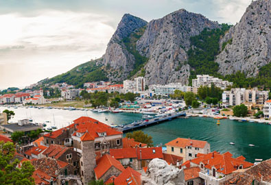 aerial panoramic landscape of the small town omis surrounded with mountains makarska riviera croatia