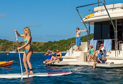 paddleboarding and enjoying the water