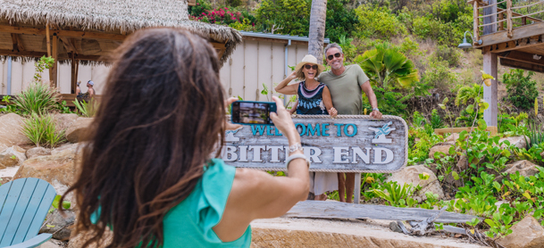 person taking a picture of couple on the BVI