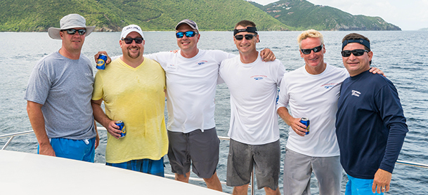 Group of Guys on Power Catamaran Charter