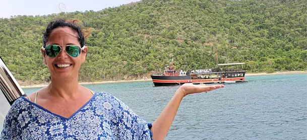 women pretending to hold a boat