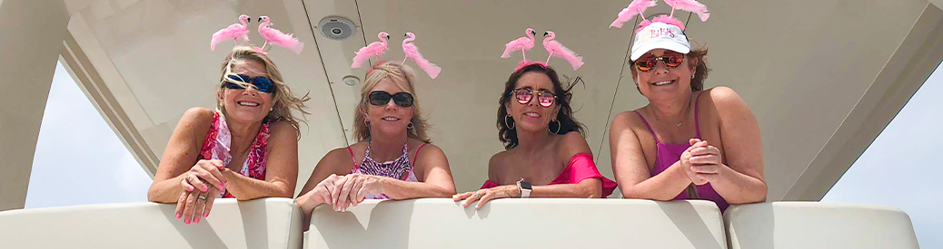 A group of people aboard a MarineMax Vacations power catamaran