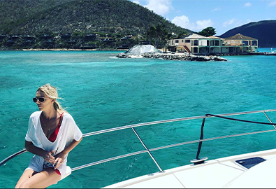 a woman on a boat in the bvi