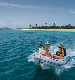 Group of people in raft on the water in BVI