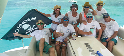 A group of people aboard a MarineMax Vacations power catamaran