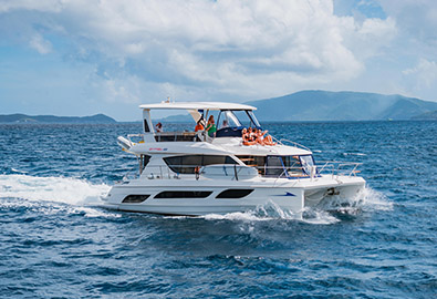 multiple people on board of a boat cruising through the water