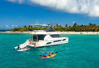 People on board of a boat and other kayaking and paddle boarding 