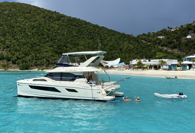 An Aquila power catamaran off the coast of Jost van Dyke