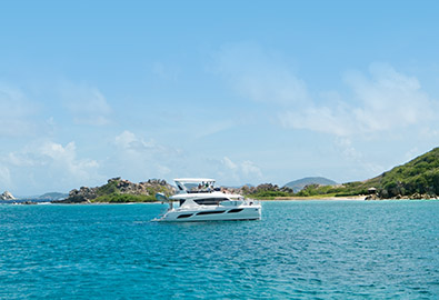 Boat anchored close to an island